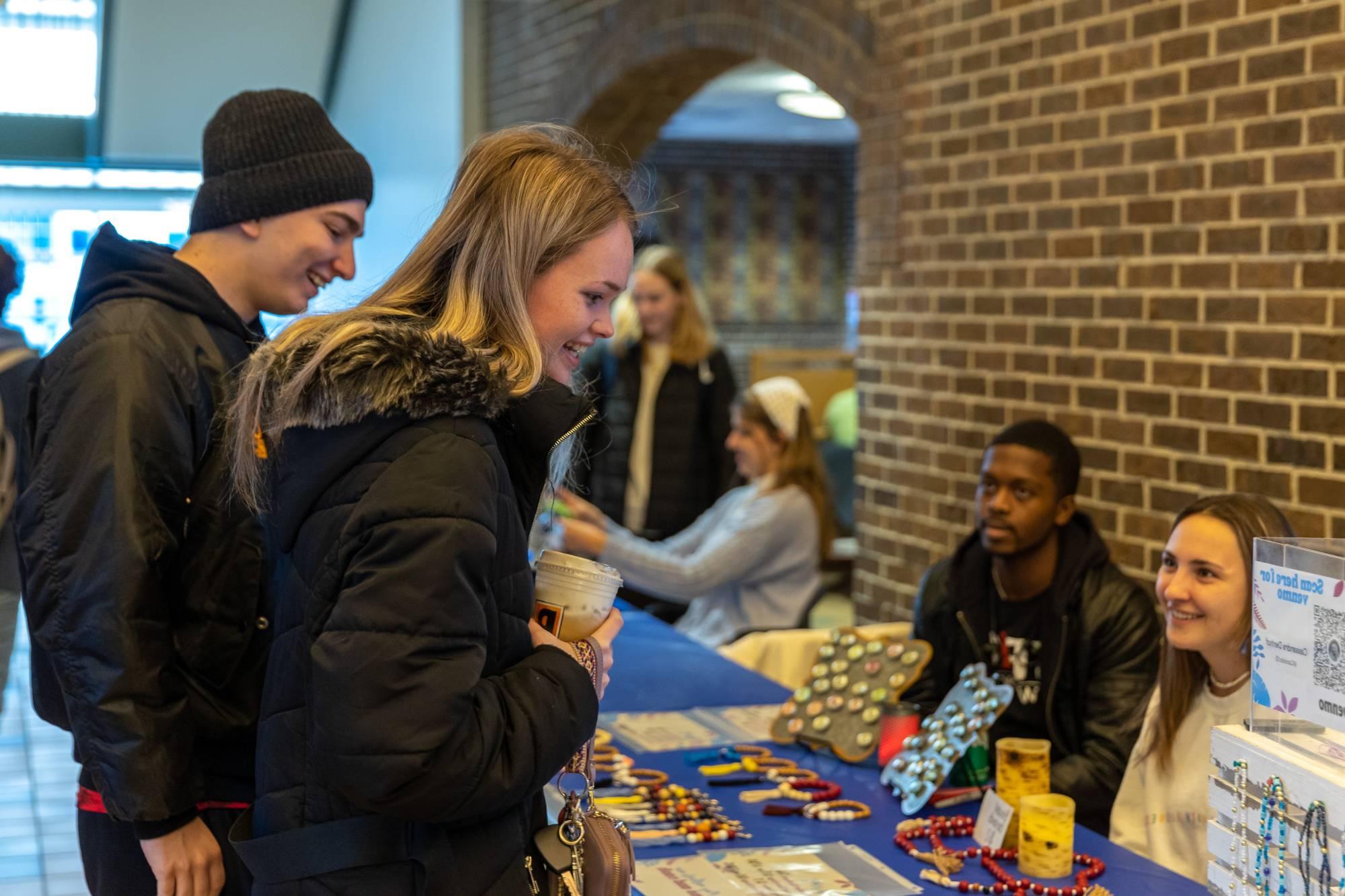 students attending the student small business market